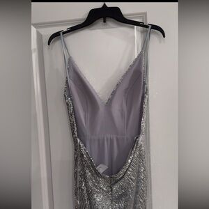 Gorgeous, silver sequin gown that was purchased for a gala